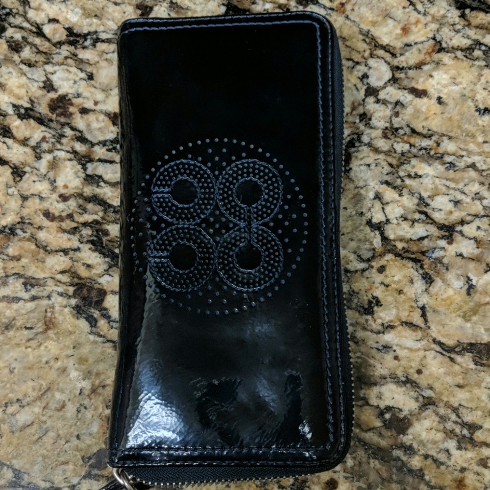 Navy blue patent leather wallet from Coach